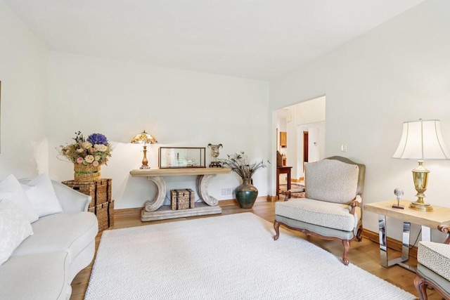 W332S9291 Red Brae Dr, Mukwonago, WI 53149 - living area featuring wood finished floors and baseboards