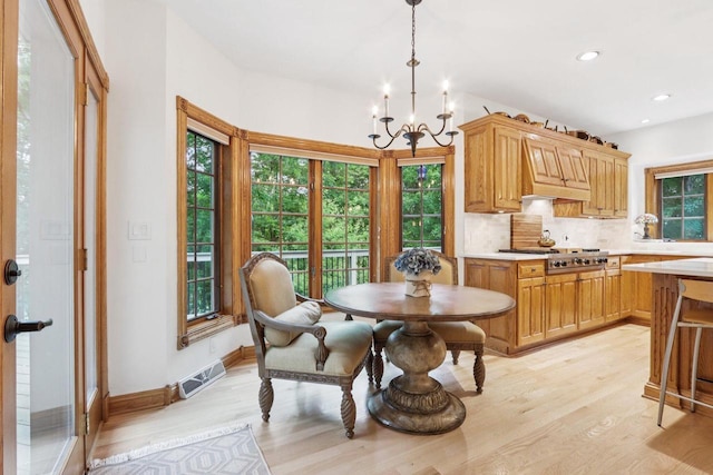 W332S9291 Red Brae Dr, Mukwonago, WI 53149 - dining space with a chandelier, light wood-style floors, and recessed lighting
