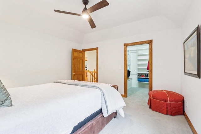 W332S9291 Red Brae Dr, Mukwonago, WI 53149 - bedroom featuring light colored carpet, a walk in closet, and a ceiling fan