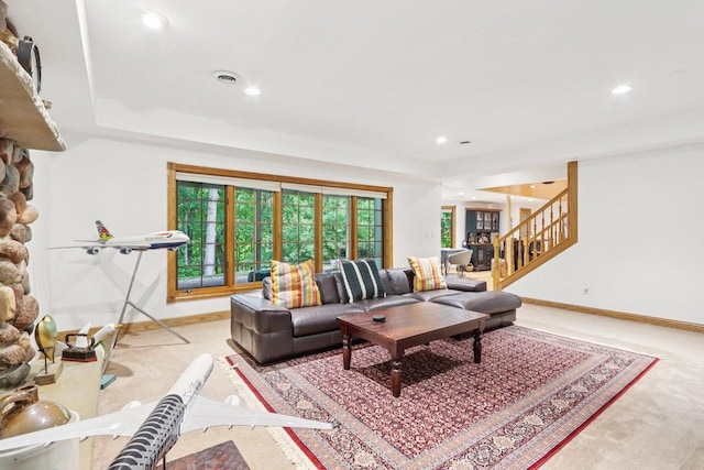 W332S9291 Red Brae Dr, Mukwonago, WI 53149 - living area featuring carpet floors, stairs, and recessed lighting