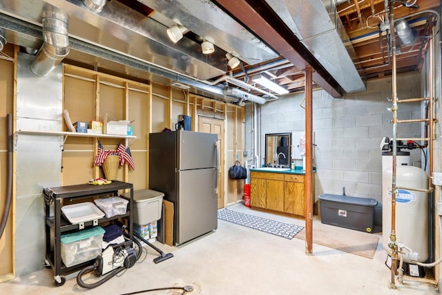 W332S9291 Red Brae Dr, Mukwonago, WI 53149 - unfinished basement featuring freestanding refrigerator and gas water heater
