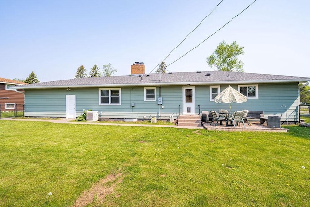 6D Hayes Ct, Superior, WI 54880 - back of house with a yard, a chimney, a patio, and entry steps