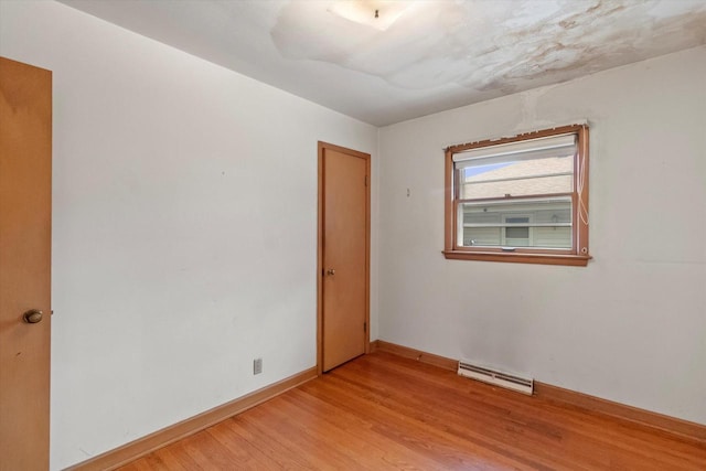 3669 S Quincy Ct, Milwaukee, WI 53207 - unfurnished room featuring light wood-style floors and baseboards