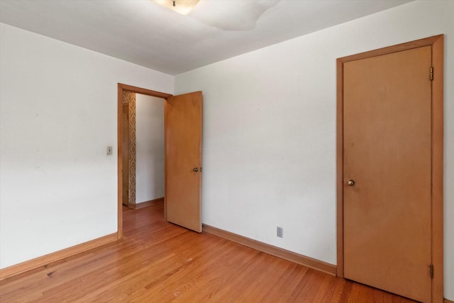 3669 S Quincy Ct, Milwaukee, WI 53207 - unfurnished room featuring light wood finished floors and baseboards