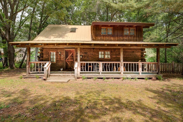 W3562 Glencoe Ave, Montello, WI 53949 - back of property with log siding and a deck