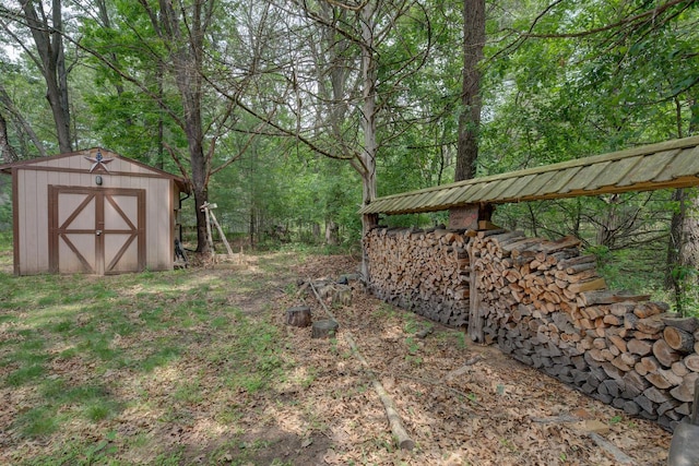 W3562 Glencoe Ave, Montello, WI 53949 - view of yard featuring a storage shed and a view of trees