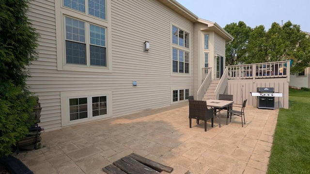 N100W17560 Whitetail Run, Germantown, WI 53022 - view of patio with area for grilling, stairway, outdoor dining space, and a deck