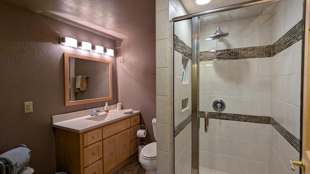 N100W17560 Whitetail Run, Germantown, WI 53022 - bathroom with a shower stall, a textured wall, and vanity