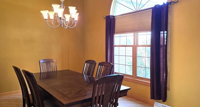4830 Parkview Rd, Waterford, WI 53185 - dining space with a chandelier and light wood-style floors