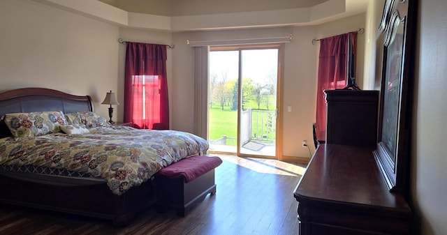4830 Parkview Rd, Waterford, WI 53185 - bedroom with access to outside and wood finished floors
