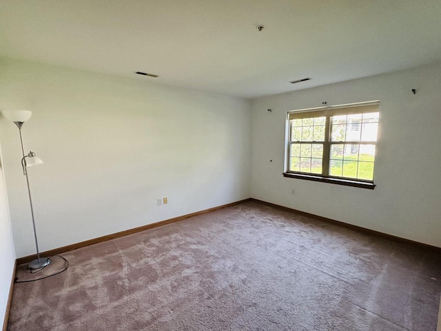 18740 Emerald Cir Unit D, Brookfield, WI 53045 - carpeted empty room featuring baseboards and fire sprinkler in ceiling
