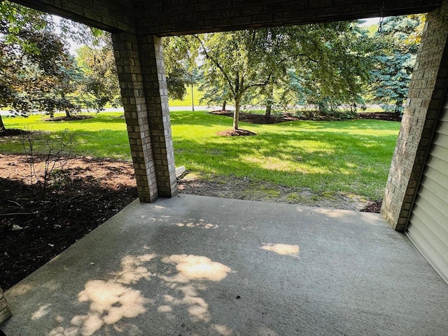 18740 Emerald Cir Unit D, Brookfield, WI 53045 - view of green lawn with a patio