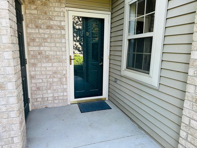 18740 Emerald Cir Unit D, Brookfield, WI 53045 - property entrance with brick siding