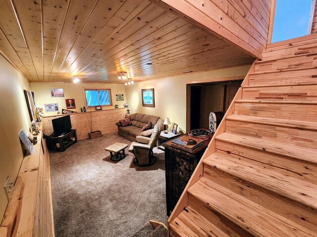 5872W Otter Ln, Winter, WI 54896 - living area with carpet, wooden ceiling, and stairs