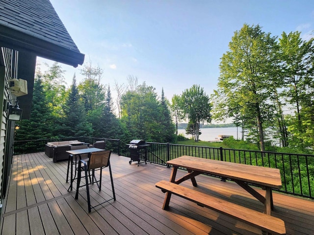 5872W Otter Ln, Winter, WI 54896 - deck with a grill, outdoor lounge area, a water view, and outdoor dining space
