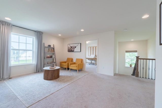 N56W24235 Torrey Pines Ln, Sussex, WI 53089 - living area with carpet floors, recessed lighting, and an upstairs landing