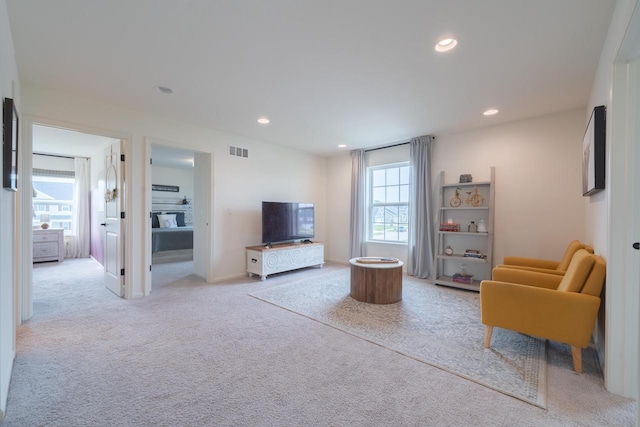 N56W24235 Torrey Pines Ln, Sussex, WI 53089 - living area featuring light carpet and recessed lighting