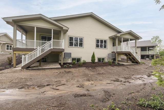 20900 Gray St, Lannon, WI 53046 - rear view of property with stairs and covered porch