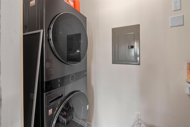 1541 N Jefferson St Unit 408, Milwaukee, WI 53202 - washroom featuring stacked washer / dryer and electric panel
