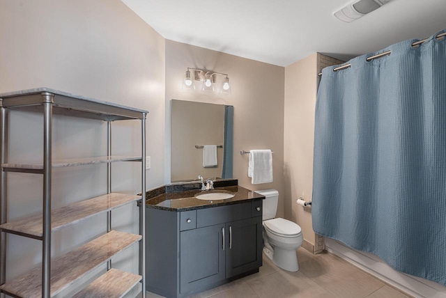 1541 N Jefferson St Unit 408, Milwaukee, WI 53202 - bathroom featuring tile patterned floors, vanity, and shower / bathtub combination with curtain