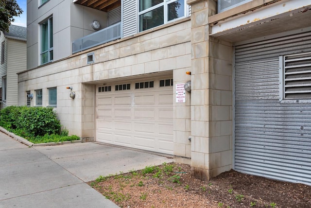 1541 N Jefferson St Unit 408, Milwaukee, WI 53202 - garage featuring driveway