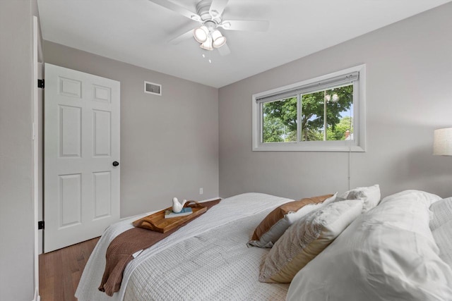 4410 N 107th St, Milwaukee, WI 53225 - bedroom with wood finished floors and a ceiling fan