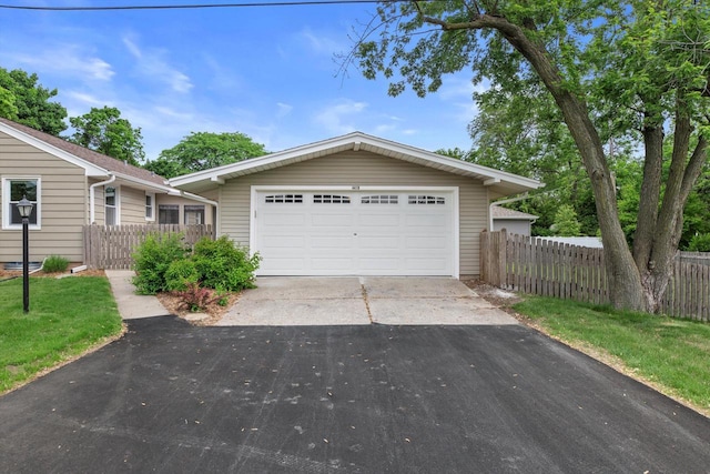 4410 N 107th St, Milwaukee, WI 53225 - view of front facade with a garage and driveway