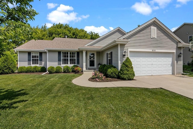 606 E Sheila Ave, Elkhorn, WI 53121 - single story home featuring concrete driveway, an attached garage, a front yard, and roof with shingles