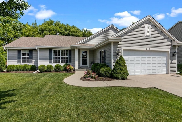 606 E Sheila Ave, Elkhorn, WI 53121 - single story home featuring driveway, an attached garage, a front lawn, and a shingled roof