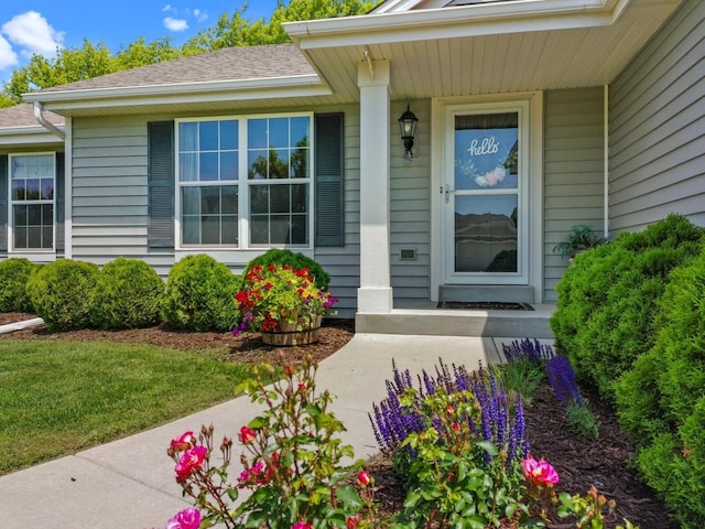 606 E Sheila Ave, Elkhorn, WI 53121 - entrance to property featuring covered porch and roof with shingles
