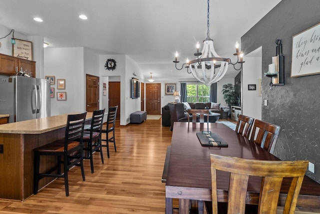 606 E Sheila Ave, Elkhorn, WI 53121 - dining area with a chandelier, light wood-style flooring, and recessed lighting