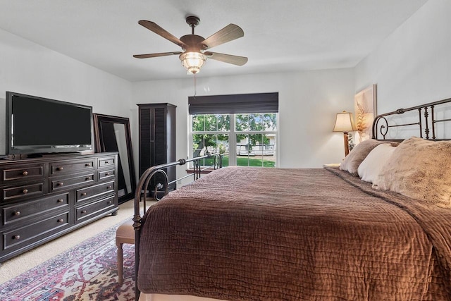 606 E Sheila Ave, Elkhorn, WI 53121 - carpeted bedroom with a ceiling fan