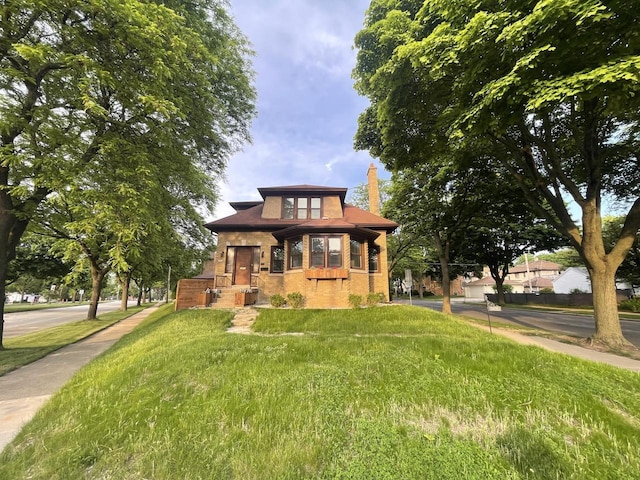 3402 N 51st Blvd, Milwaukee, WI 53216 - view of front of property with a chimney and a front yard