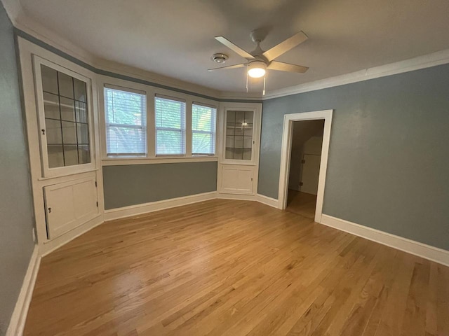 3402 N 51st Blvd, Milwaukee, WI 53216 - empty room featuring ornamental molding, ceiling fan, and light wood-style flooring
