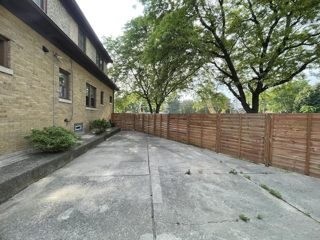 3402 N 51st Blvd, Milwaukee, WI 53216 - fenced backyard with a patio
