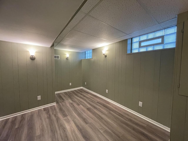 3402 N 51st Blvd, Milwaukee, WI 53216 - basement featuring wood finished floors, healthy amount of natural light, and a drop ceiling