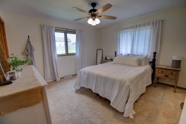 N4374 Esther Dr, Onalaska, WI 54650 - bedroom with light colored carpet and ceiling fan