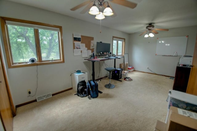 N4374 Esther Dr, Onalaska, WI 54650 - unfurnished living room with carpet floors, ceiling fan, and an office area