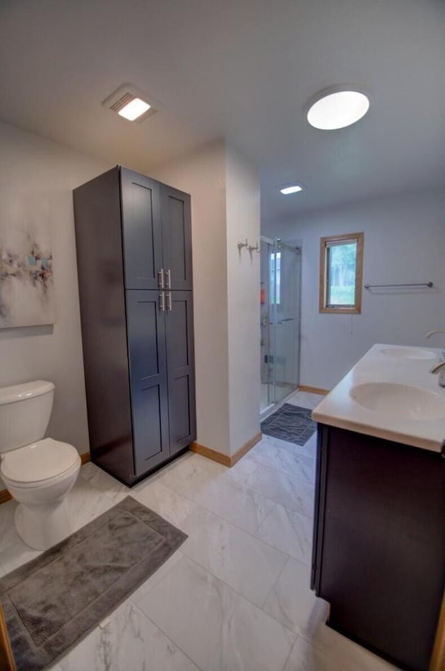 N4374 Esther Dr, Onalaska, WI 54650 - bathroom with a stall shower, double vanity, and marble look tiles