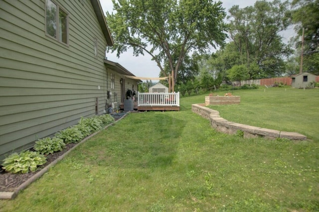 N4374 Esther Dr, Onalaska, WI 54650 - view of yard featuring a storage shed and a deck