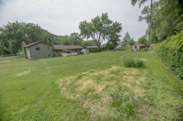 N4374 Esther Dr, Onalaska, WI 54650 - view of green lawn featuring a storage unit