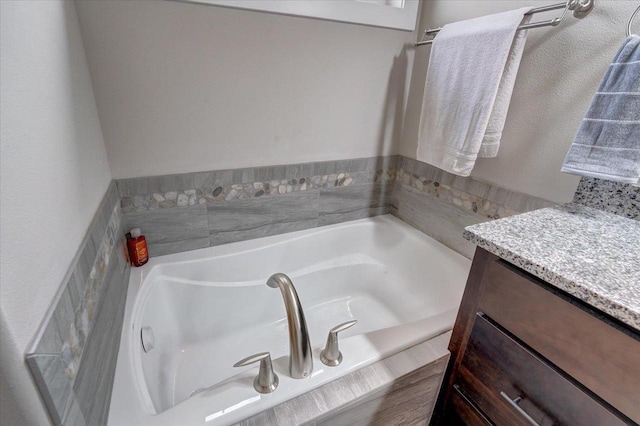 3007 Mourning Dove Dr, Cottage Grove, WI 53527 - full bathroom with a garden tub and vanity