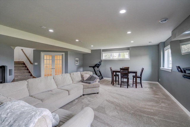 3007 Mourning Dove Dr, Cottage Grove, WI 53527 - carpeted living area with stairs, recessed lighting, french doors, and healthy amount of natural light