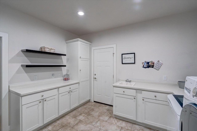 3007 Mourning Dove Dr, Cottage Grove, WI 53527 - kitchen with open shelves, white cabinetry, light countertops, and recessed lighting