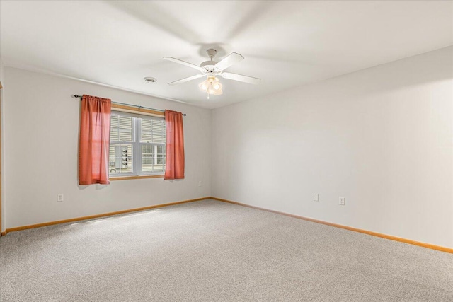 677 Wood River Ct, West Bend, WI 53095 - carpeted empty room featuring ceiling fan and baseboards