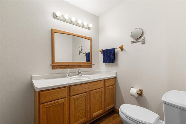 677 Wood River Ct, West Bend, WI 53095 - half bath featuring toilet and vanity