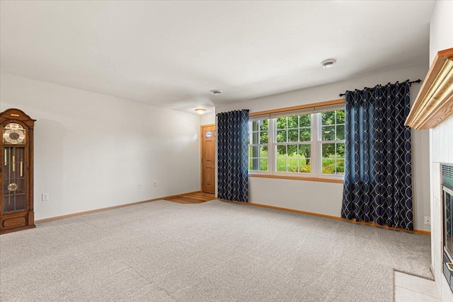 677 Wood River Ct, West Bend, WI 53095 - carpeted spare room featuring baseboards