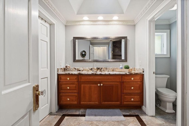 900 Hawks Holw, Delafield, WI 53018 - bathroom with inlaid floor details, vanity, and ornamental molding