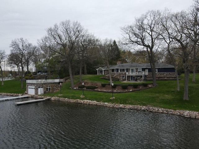 900 Hawks Holw, Delafield, WI 53018 - dock area featuring a yard and a deck with water view