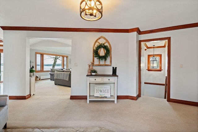 900 Hawks Holw, Delafield, WI 53018 - hall with carpet, ornamental molding, and a chandelier